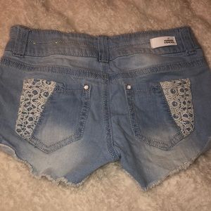 Light wash stretchy jean shorts